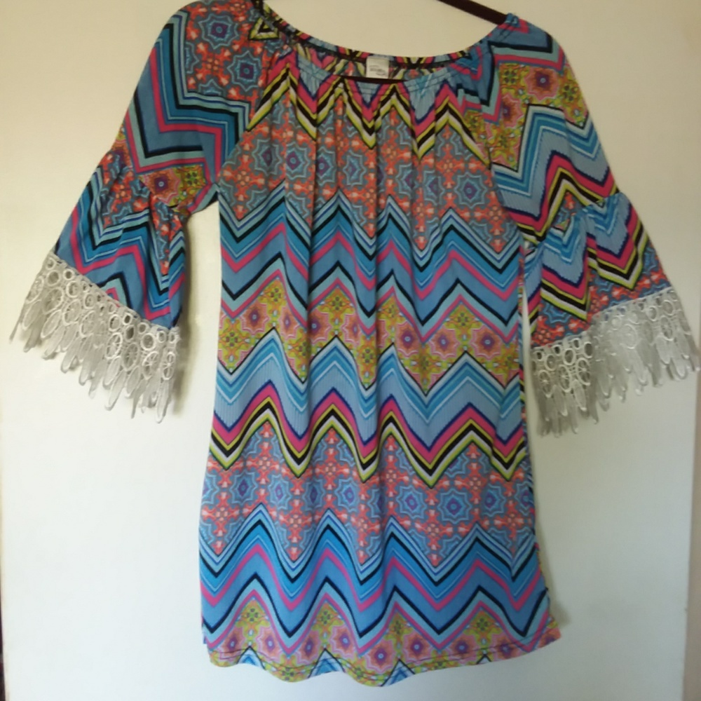 WIN WIN tunic in size s-m.